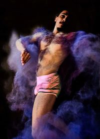 Full length of shirtless man