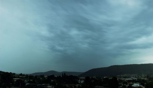 Townscape against cloudy sky