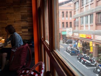 Woman sitting in bus