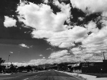 View of road against cloudy sky