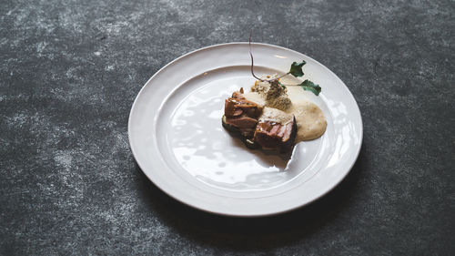 High angle view of dessert in plate on table