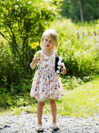 Girl holding flower