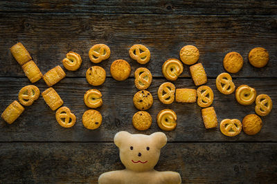 High angle view of cookies and teddy bear on table