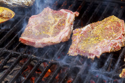 Close-up of meat on barbecue grill