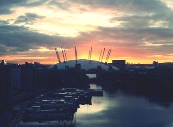 Dramatic sky over city at sunset