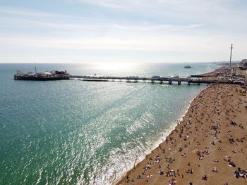 High angle view of people on beach against sky