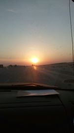 Scenic view of landscape against sky during sunset