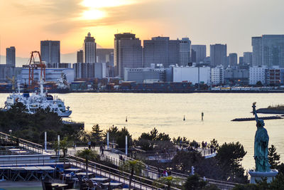 View of cityscape against sky during sunset