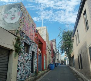 Narrow alley with buildings in background