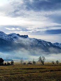 Scenic view of snow field against sky