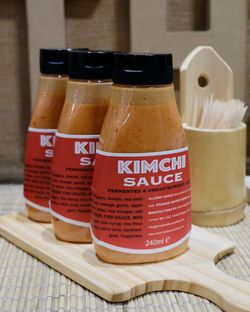 Close-up of wine glasses on table