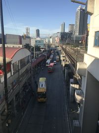 High angle view of train on street in city