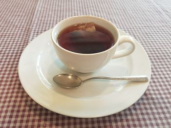 Close-up of tea cup on table