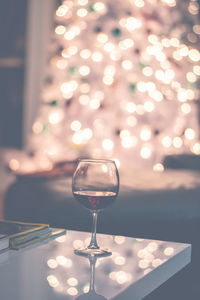 Close-up of wine glass on table