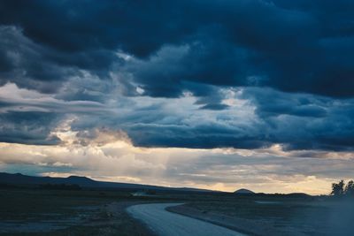 Road against sky during sunset
