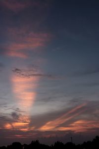 Low angle view of dramatic sky during sunset