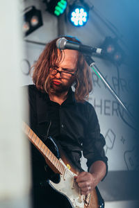 Young man playing guitar