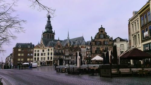 View of buildings against sky in city