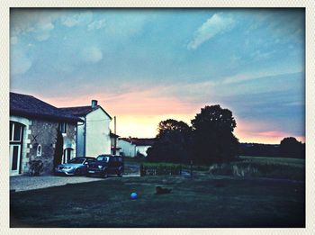 Built structure against sunset sky