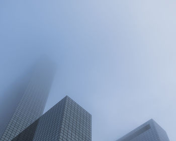 Low angle view of modern building against clear sky