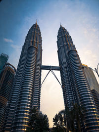 Low angle view of buildings in city against sky