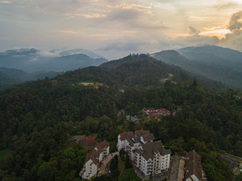 High angle view of trees and mountains against sky