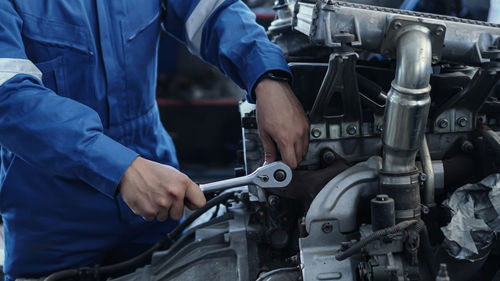 Man working in car