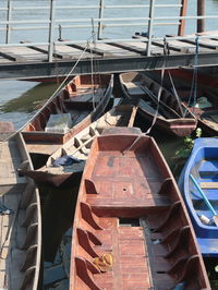 High angle view of sailboats moored in sea