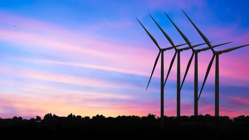 Low angle view of silhouette plants against sky during sunset