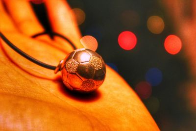 Close-up of hand holding paper