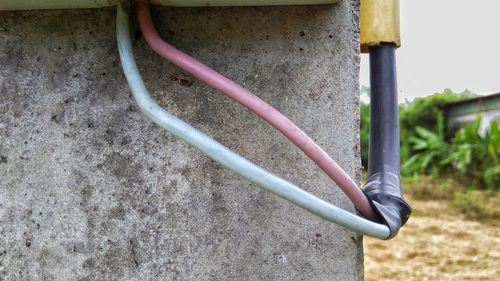 Close-up of pipe on wall