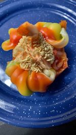 High angle view of chopped fruits in plate