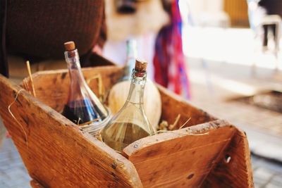 Close-up of wine bottles on table