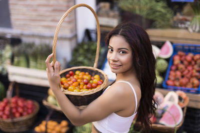 Midsection of woman holding food