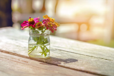 Close-up of flower vase on table