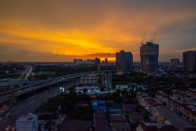 High angle view of city at sunset