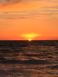 Scenic view of sea at sunset