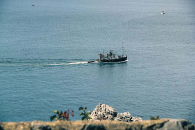 High angle view of sailboat sailing on sea