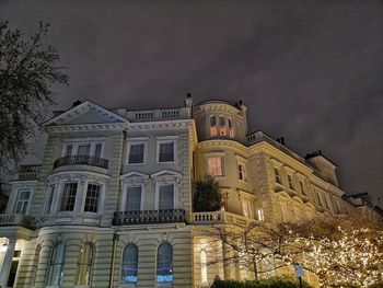 Low angle view of building against sky at night