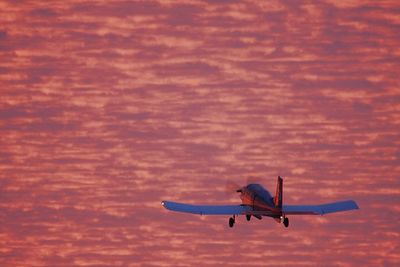 Airplane flying over sky