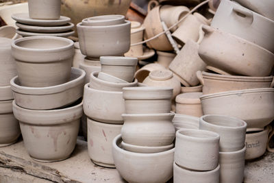 Close-up of pottery for sale at market