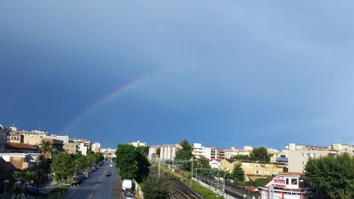 View of rainbow over town