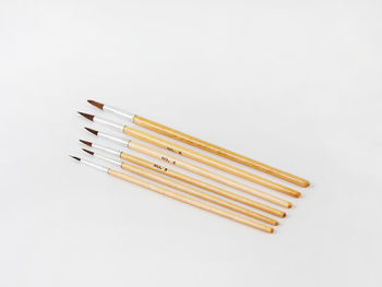 High angle view of pencil on white background