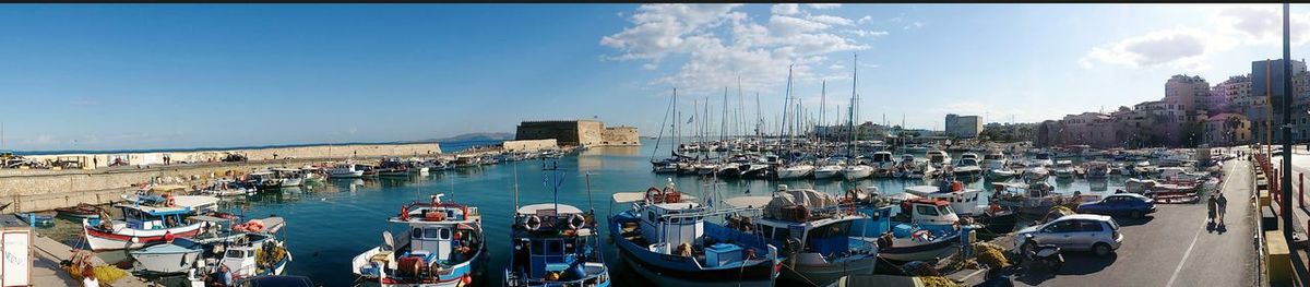 Boats moored in sea