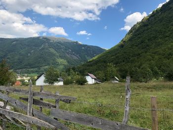 Scenic view of landscape and mountains against sky