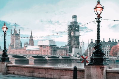 Morning view of big ben covered by scaffolding for renovation 