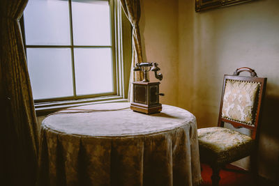 Table and chairs in old house