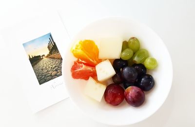 High angle view of fruits in plate on table