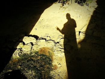 Shadow of man on woman