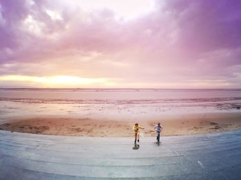 Scenic view of sea against cloudy sky